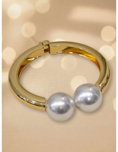 Pulseira dourada com pérola